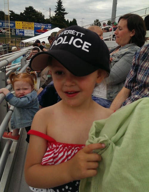 Ava wearing the police officer’s hat