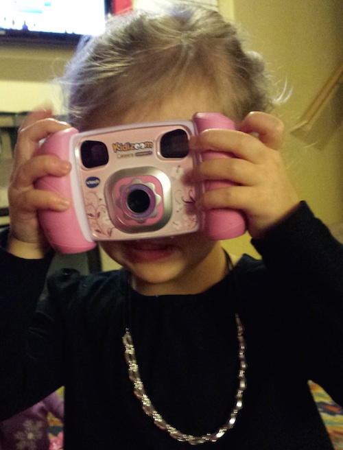 Ava loves her new camera from Uncle Joel and Aunt Melanie