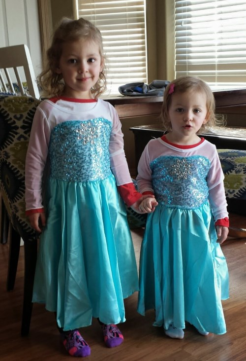 The girls in their new Elsa dresses