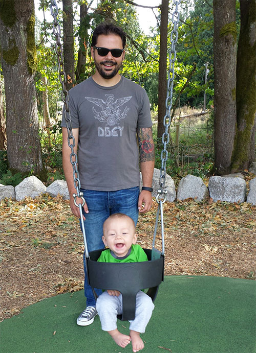 Pushing Enzo on a swing for the first time
