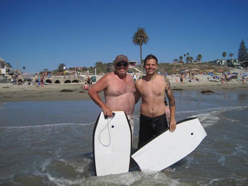 Rick and me boogie boarding at Moonlight Beach