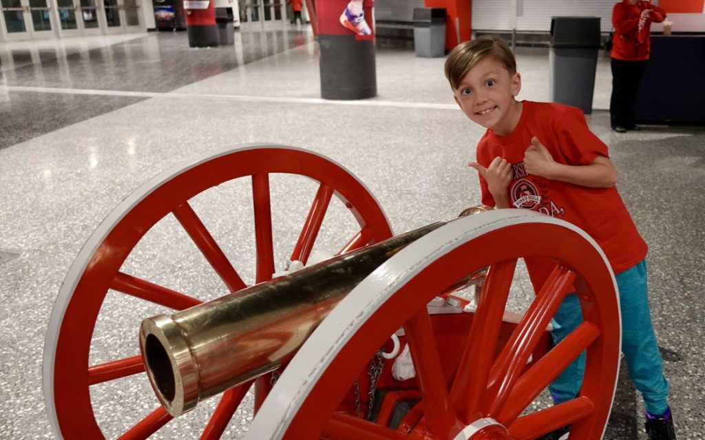 Enzo Pellegrini posing with a cannon at the Thomas and Mack Center in Las Vegas.