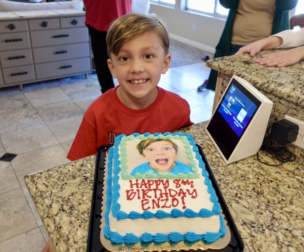 Enzo posing with his 8th birthday cake.