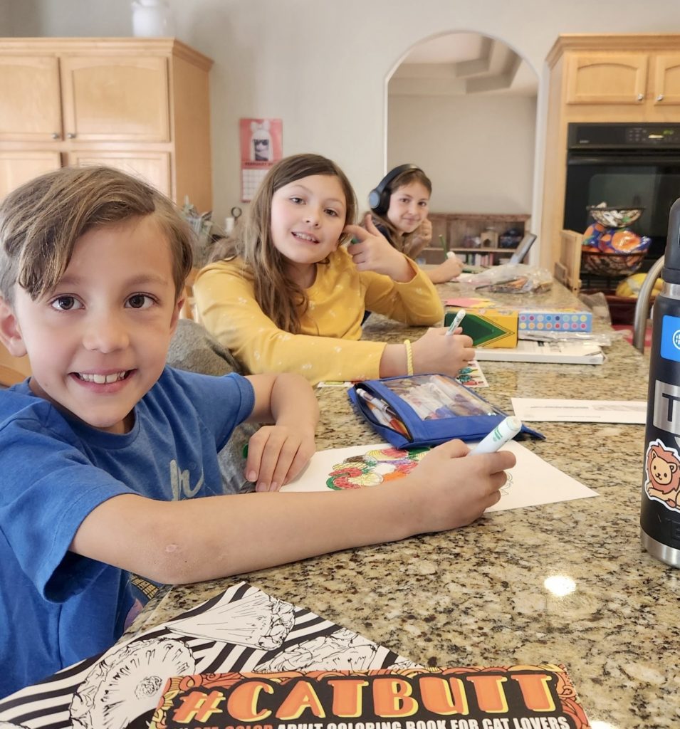 The Pellegrini Kids at home making thank you cards for their recent school donations
