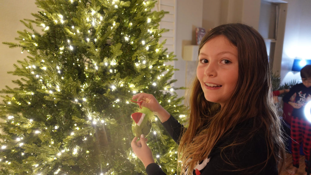 Elise decorating our Christmas tree