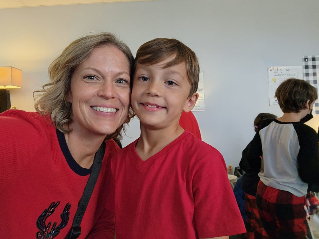Enzo and Mom at a school holiday party