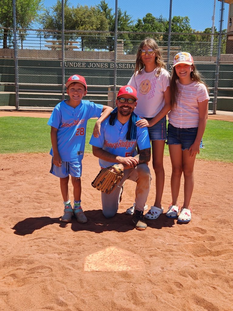 Dad and kids after the baseball game