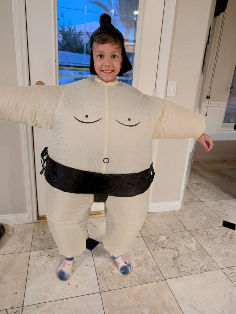 Enzo dressed up as a sumo wrestler for Halloween, 2024