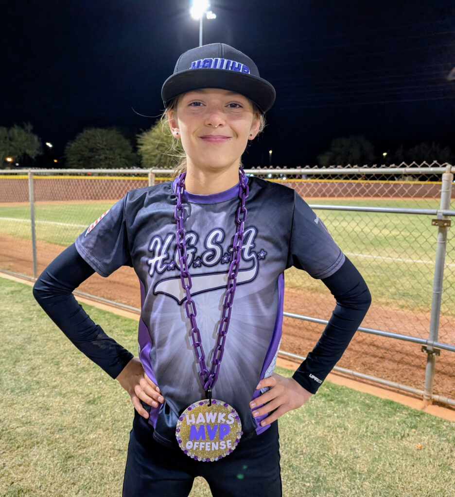 Ava with her first softball Offensive MVP award