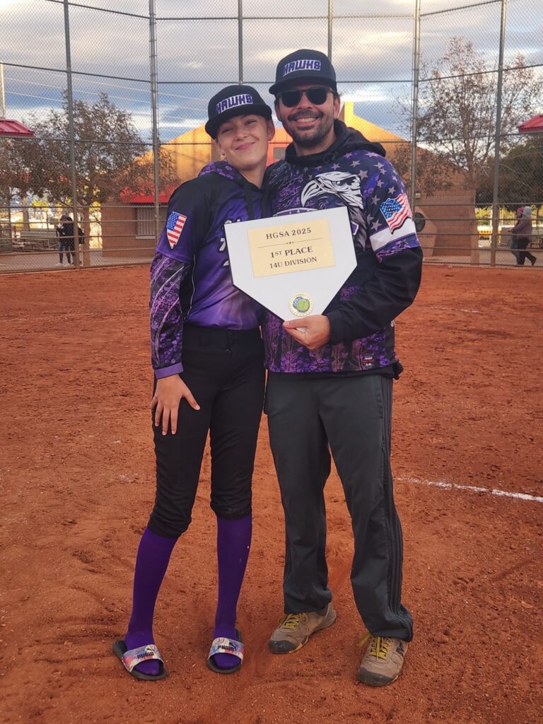 Ava and Dad celebrating the championship win