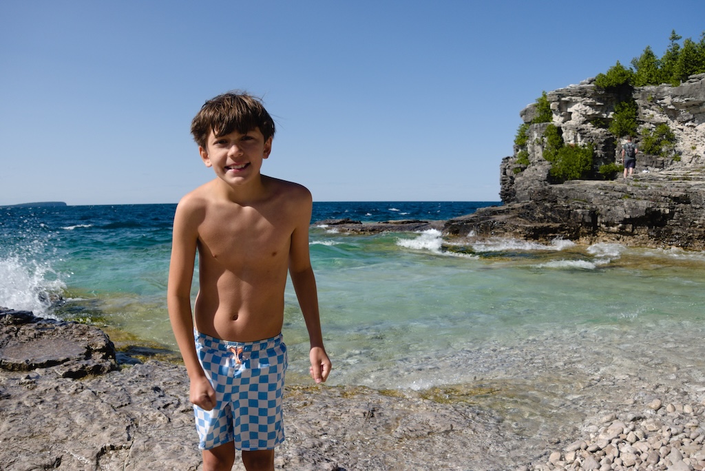 Enzo Pellegrini on the shoreline of Georgian Bay